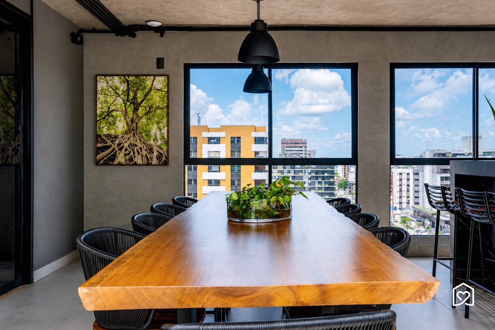 Communal table by the window — Way Tambaú